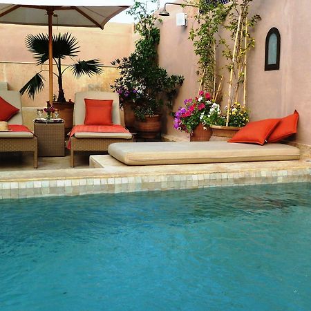 Riad Viva Marraquexe Exterior foto A swimming pool in Morocco