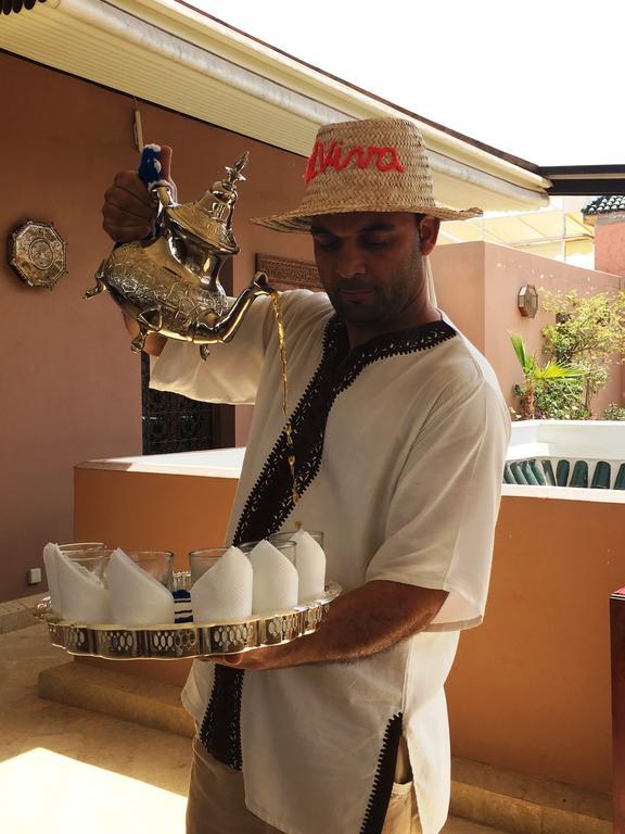 Riad Viva Marraquexe Exterior foto Moroccan coffee being served