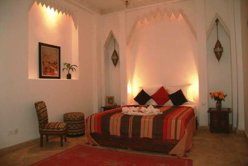 Riad Viva Marraquexe Exterior foto A bedroom in a Moroccan riad